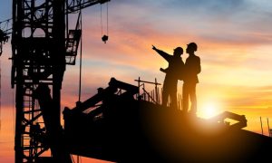 Construction workers' silhouettes, signifying expansion of Sky River Casino