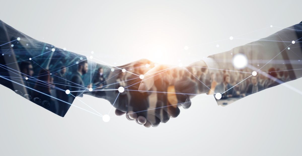 Two hands shaking signifies Sparket/PENN partnership