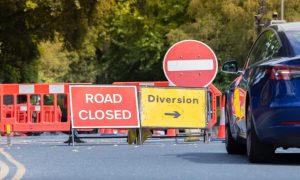 Road Closed sign signifies opposition for Koi Nation casino